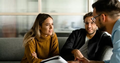A team working on in-person meetings