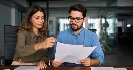 Executive Assistant taking her executive through a proposal to become a strategic partner
