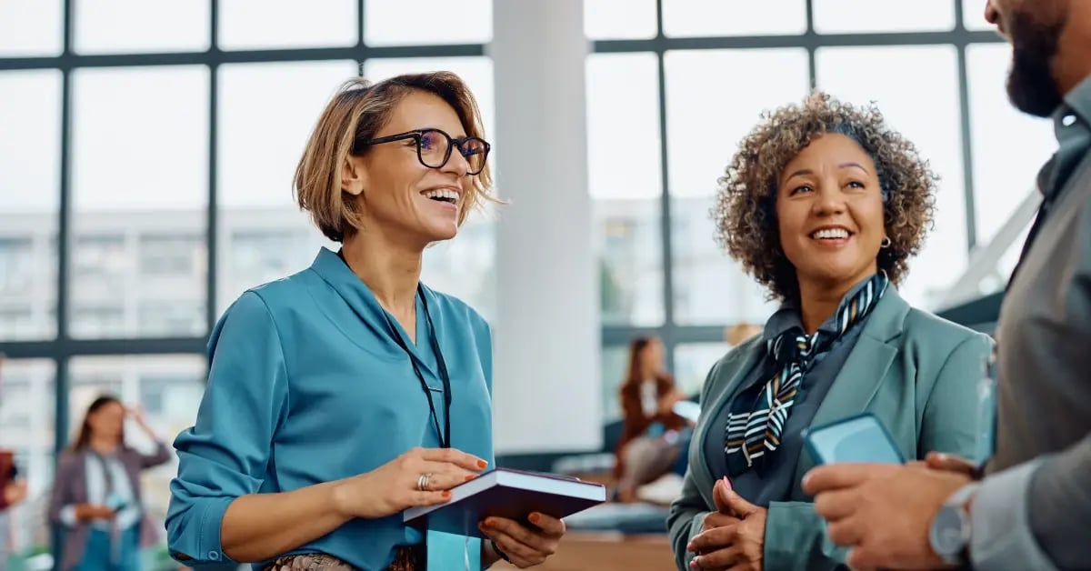 Executive Assistants networking at a business conference