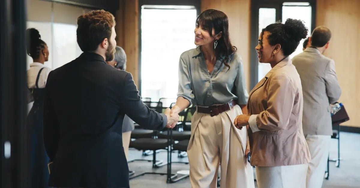 Executive Assistants networking at an event
