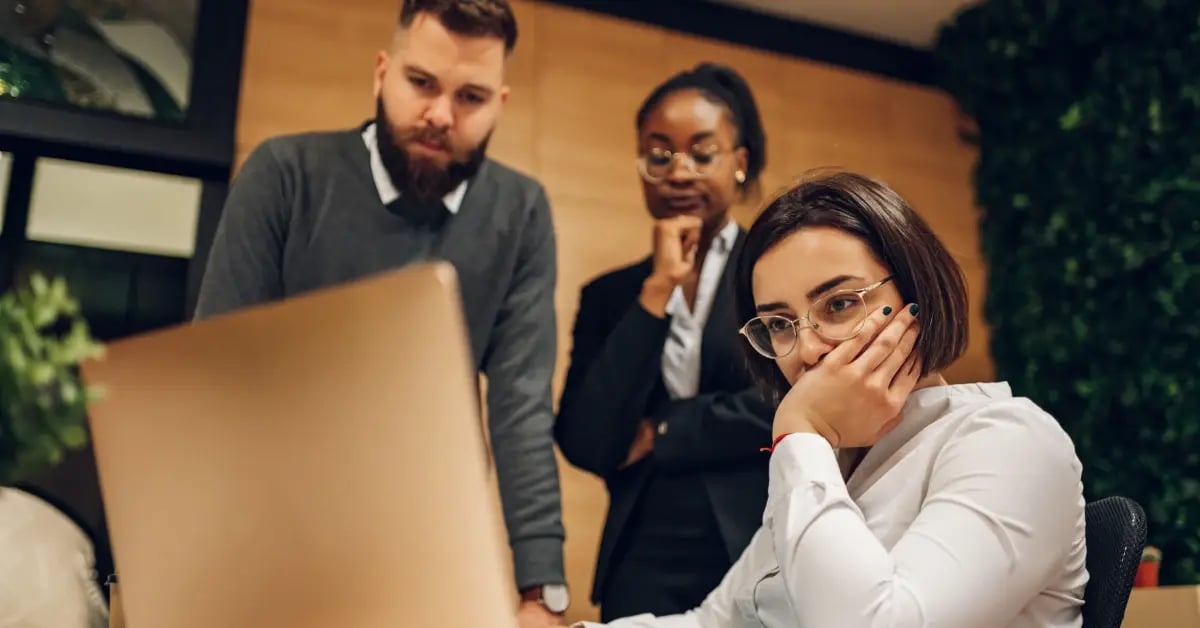 Stressed team of meeting planners planning a last-minute meeting