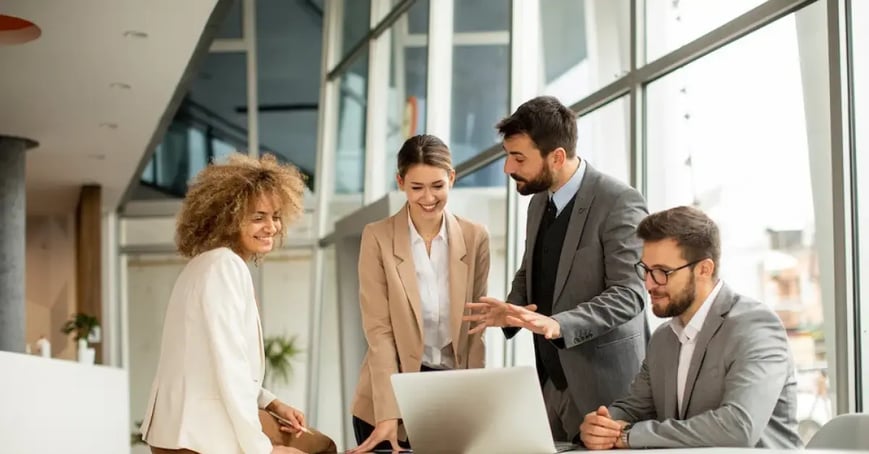 Team in an office meeting to discuss the attendee experience