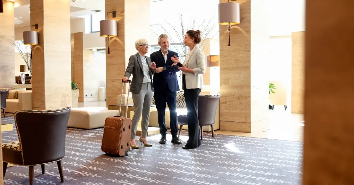 Team meeting in the lobby before the in-person gathering starts