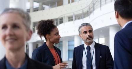 Meeting attendees at a conference